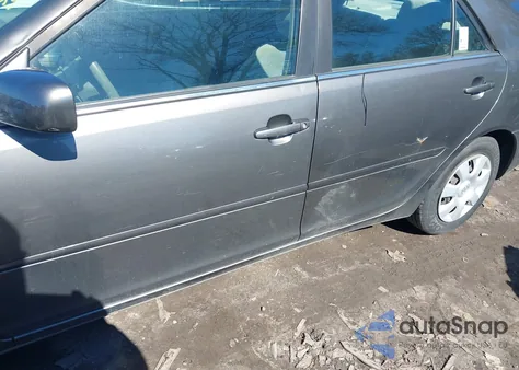 2003 Toyota Camry Le z USA, uszkodzony, nr VIN JTDBE32K930149280